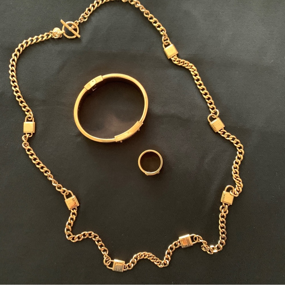Michael Kors rose gold necklace, bracelet and ring